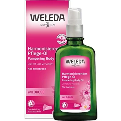 Abbildung von WELEDA Bio Wildrose Körperöl ätherisches Naturkosmetik Hautpflege Massageöl / Pflegeöl mit Jojobaöl &amp; Mandeöl zur Pflege von trockener Haut angenehmen Rose Ylang Duft (vegan, 100ml)
