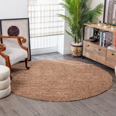 Abbildung von Surya Home Shaggy Berber Teppich Flauschiger für Wohnzimmer, Esszimmer, Schlafzimmer, Langflor Hochflor flauschig groß 120 cm Rund, Wohnzimmerteppich in Hellbeige