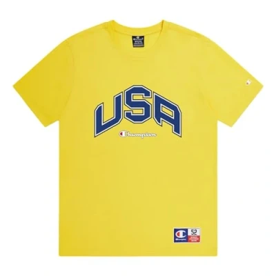 Abbildung von Champion Herren Legacy Retro Sport USA S/S Crewneck T Shirt, gelb, Large