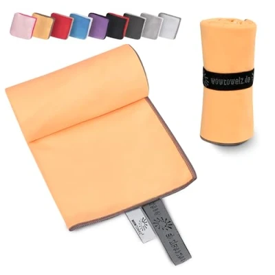 Abbildung von Wowtowelz kompaktes Mikrofaser Handtuch, Reisehandtuch, Sport Fitnesshandtuch, Strand Badetuch, leicht u. schnelltrocknend, (Orange, 90 x 60 cm)