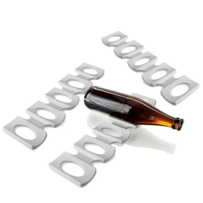 Abbildung von com four® 3x Flaschenhalter Kühlschrank Faltbare Silikon Flaschenablage, Bier und Getränkehalter, Wein Organizer, Dosenhalter Stapelhilfe für Flaschen &amp; Dosen (grau)