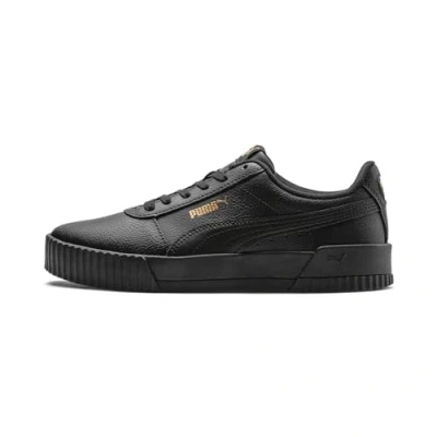 Abbildung von Puma Carina Sneaker low, Damen, Größe: 42, Black/team gold Leder und lederimitat