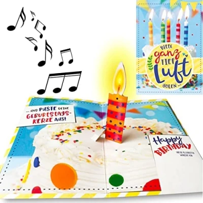 Abbildung von bentino Geburtstagskarte mit MUSIK und LEUCHTENDER PopUp Kerze zum AUSPUSTEN. Spielt den Song Celebration (Coverversion), DIN A5 Set Umschlag