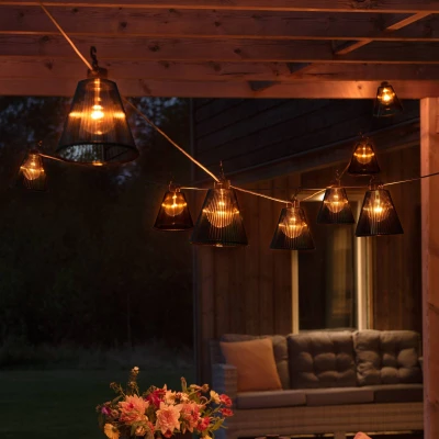 Abbildung von Konstsmide LED Biergartenketten System Erweiterung, für 2333 XXX, 10 klare Birnen/bernsteinfarbene Dioden, Außen (IP44), schwarzes Kabel 2334 830