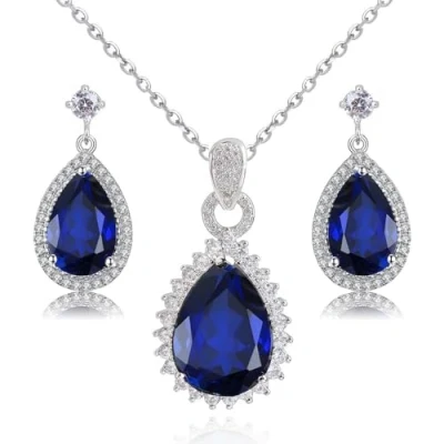 Abbildung von Crystalline Azuria Tropfenform Blauer simulierter Saphir Zirkonia Kristalle Schmuck Set Halskette Anhänger 45 cm Ohrringe18 kt Weiß Vergoldet