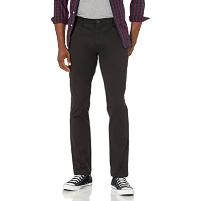 Abbildung von Amazon Essentials Herren Chinohose, Komfortabler, Gewaschener Stretch, Skinny Passform (Früher Goodthreads), Schwarz, 34W / 32L