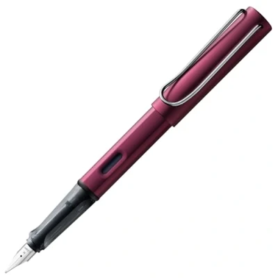Abbildung von Lamy AL star black purple Füller Füllhalter mit ergonomischem Griff &amp; polierter Stahlfeder in Strichbreite M leichtes Aluminiumgehäuse inkl. Tintenpatrone T 10 blau Rechtshänder