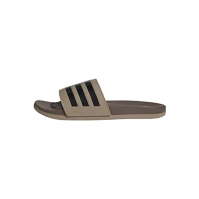 Abbildung von adidas Unisex Adilette Comfort Slides, Blanch Cargo/core Black/Earth strata, 48 2/3 EU