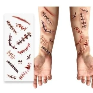 Abbildung von FIESTAS GUIRCA Narben Tattoo Rot (30x13 cm) Make up und FX für Halloween, Karneval Kostümpartys Ideal Kinder Erwachsene