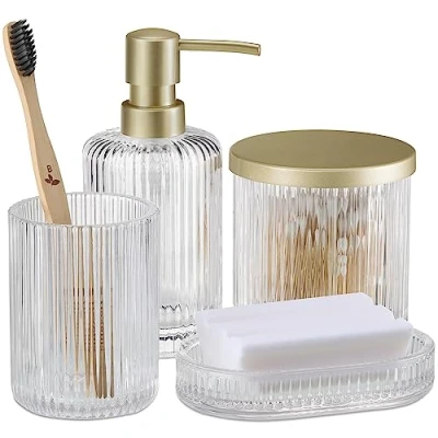 Abbildung von Navaris Badezimmer Set 4 teilig aus Glas dekoratives Badzubehör mit Zahnputzbecher Seifenspender Seifenschale Glasdose Bad Accessoires Gold