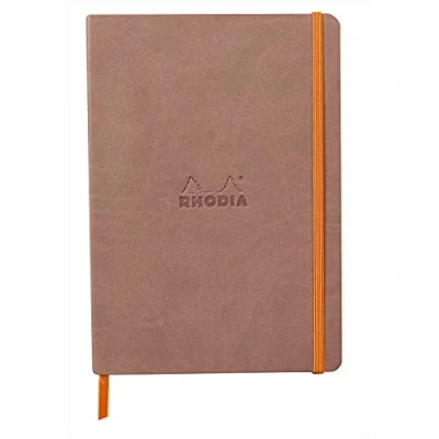 Abbildung von Rhodia 117438C Notizheft Softcover Rhodiarama DIN A5 (14,8x21 cm), 80 Blatt, liniert Clairefontaine Papier Elfenbein 90g Lesezeichen, Gummizugverschluss, Cover aus Kunstleder Roseholz, 1 Stück