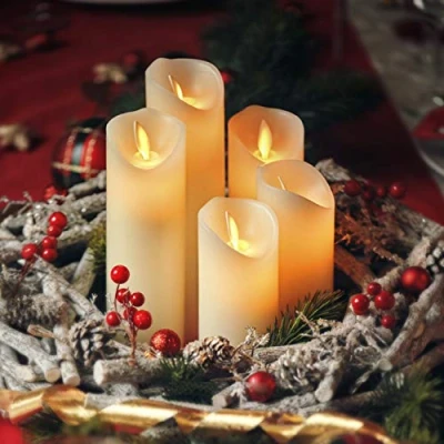 Abbildung von CCLIFE LED Kerzen Echtwachs 5er Set mit Fernbedienung Timer Funktion flammenlose Batteriebetrieb