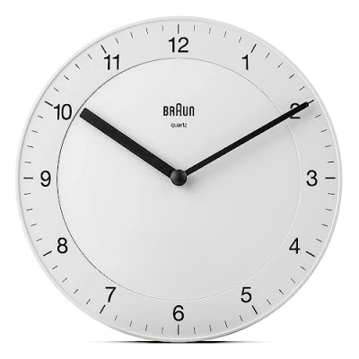 Abbildung von Braun Klassische analoge Wanduhr ruhigem Quarzuhrwerk, leicht lesbarem Zifferblatt mit 20 cm Durchmesser in Weiß, Modell BC06W.