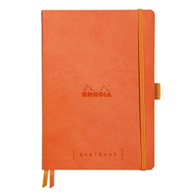 Abbildung von Rhodia 117774C Notizheft Goalbook (DIN A5, 14,8 x 21 cm, kariert, praktisch und trendige, mit weichem Deckel, 90g, elfenbeinfarbigem Papier, 120 Blatt, Gummizug, Lesezeichen) 1 Stück, Tangerine