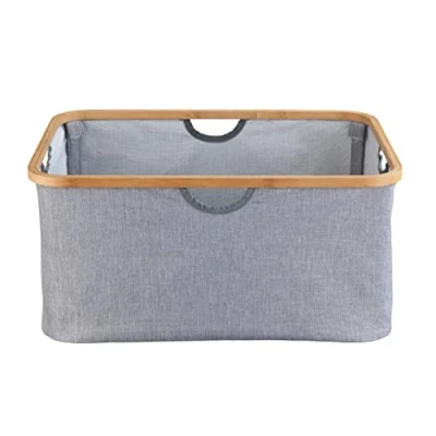 Abbildung von WENKO Wäschekorb Mod. Bahari, moderner Wäschesammler mit hochwertigem Bambus Rahmen, platzsparend zusammenklappbar, 50 Liter Fassungsvermögen, 54 x 36 26 cm, aus pflegeleichtem Polyester