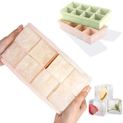 Abbildung von LessMo Eiswürfelform, 2er Pack XXL Silikon Eiswürfelbehälter mit Deckel, BPA Frei Für 16 Große Eiswürfel (5cm) [Updated] (Pink Grün)
