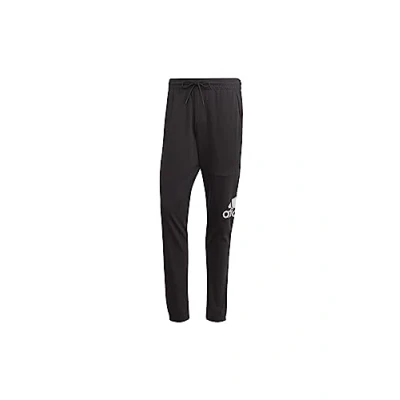 Abbildung von adidas Herren Essentials Single Jersey Tapered Badge of Sport Pants Hose, Black, XL