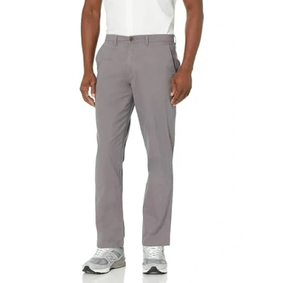 Abbildung von Amazon Essentials Herren Lässige Stretch Chinohose mit sportlicher Passform (in Übergrößen erhältlich), Kohlegrau, 30W / 29L