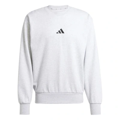 Abbildung von adidas Herren Essentials FEELCOZY Fleece Sweatshirt, Light Grey Heather/Black, S