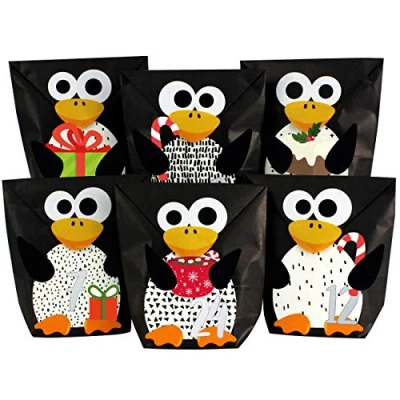 Abbildung von Papierdrachen DIY Adventskalender 2024 zum Befüllen ausgestanzte Pinguine mit 24 schwarzen Papiertüten selbst und Selberbasteln Weihnachten für Kinder