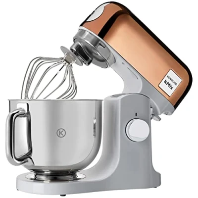 Abbildung von Kenwood kMix Editions KMX760GD Küchenmaschine, 5 l Edelstahl Schüssel, Safe Use Sicherheitssystem, Metallgehäuse, 1000 Watt, inkl. 3 Teiligem Patisserie Set und Spritzschutz, Rosé Gold