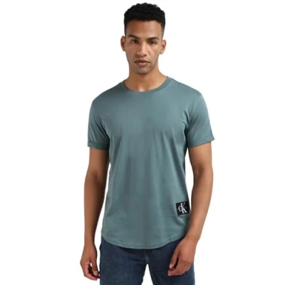 Abbildung von Calvin Klein Herren T Shirt Kurzarm Badge Turn Up Sleeve Rundhalsausschnitt, North Atlantic (Türkis), XXS