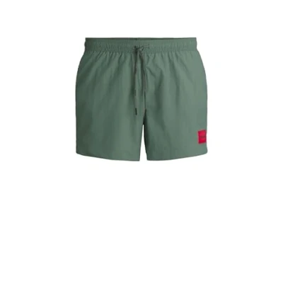 Abbildung von HUGO Dominica Badeshorts, Herren, Größe: Medium, Open green