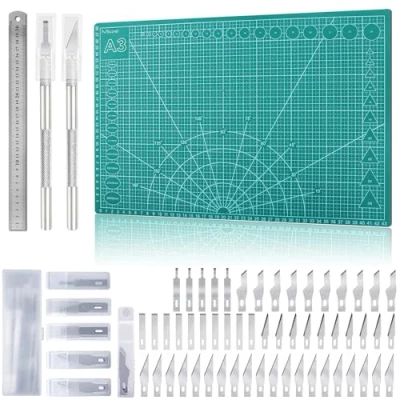 Abbildung von Miuzei Schneidematte Set A3 mit 55stk Bastelmesser und Stahllineal,Selbstheilende Bastelunterlage Schneideunterlage Cutting Mat Basteln Zeichenunterlage Bastelskalpell Bastelmatte (Grün)