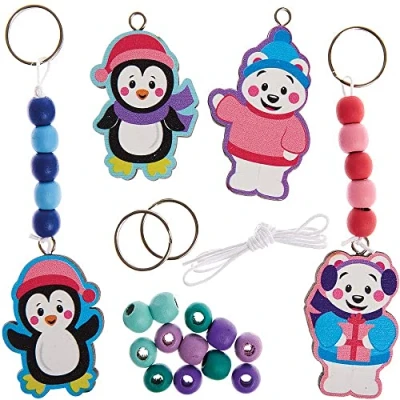 Abbildung von Baker Ross FX352 Pinguin und Eisbär Schlüsselanhänger Bastelsets aus Holz 4er Pack, Kleine für Kinder,