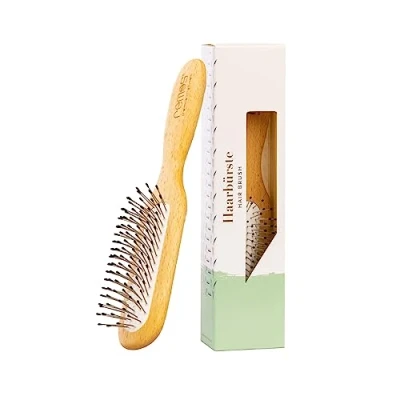 Abbildung von REMOS Haarbürste schmal mit Stahlstiften und Noppen geeignet für alle Haartypen