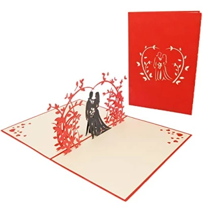 Abbildung von Favour Pop Up® 3D Glückwunschkarte zur Hochzeit. Ein filigranes Kunstwerk, dass beim Öffnen mit einem Hochzeitspaar unter Rosenstrauch überrascht. TW016 …
