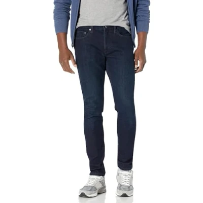 Abbildung von Amazon Essentials Herren Stretchjeans, Skinny Passform, Blau Überfärben, 36W / 34L