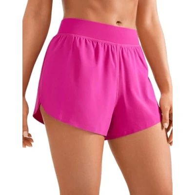 Abbildung von CRZ YOGA Damen Mid Waist Running Shorts Seitliche Splits Sport Workout Kurze Hose Leichte Atmungsaktive Sporthose Laufhose Hibiskus Purpur 34