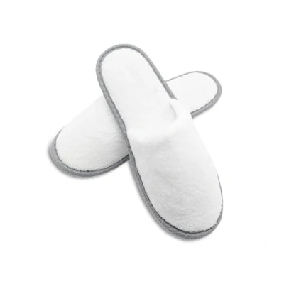 Abbildung von ZOLLNER 10 Paar Einwegslipper in weiß mit grauem Rand Frottierslipper für Reise, Spa und Zuhause Rutschhemmende Noppensohle geschlossene Spitze Einheitsgröße Hotelqualität
