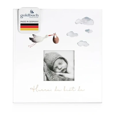Abbildung von goldbuch 15 474 Babyalbum Hurra Du bist da!, Babybuch 30 x 31 4 cm, Foto Album, 58 weiße Blankoseiten, illustrierte Seiten, Einband aus Kunstdruck mit Goldprägung, Unisex, Fotobuch Weiß