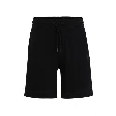 Abbildung von BOSS ORANGE Sweatshorts »Sewalk«, mit Markenlabel