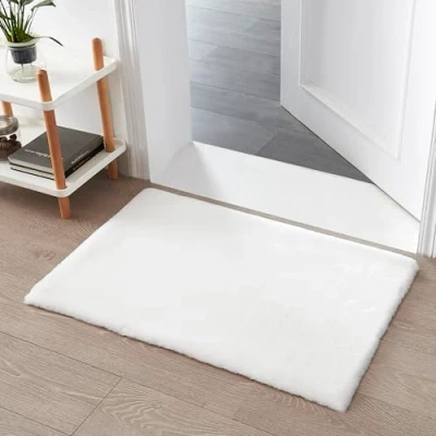 Abbildung von Teppich Wölkchen Fellteppich Kunstfell Waschbar, Hasenfell Imitat, Kaninchenfell, Kurzfell Flauschiger Wohnzimmer, Bettvorleger Schlafzimmer, Fell Weiss 60x90cm