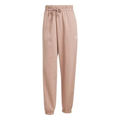 Abbildung von adidas Sportswear Essentials Small LOGO Cuffed Jogginghose, Damen, Größe: XL, Warm clay/white