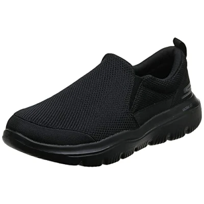 Abbildung von Skechers Men&#039;s Go Walk Evolution Ultra impec Slip On Trainers, Black (Black Textile Bbk), 10 UK (44.5 EU)