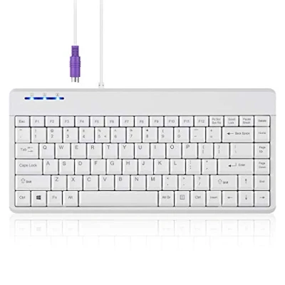 Abbildung von Perixx PERIBOARD 409PW Kabelgebundene PS2 Mini Tastatur, 31,4 x 14,6 2 cm, Weiß, US Englisch Layout, PB 409PWUS 11829