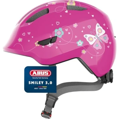 Abbildung von ABUS Kinderhelm Smiley 3.0 Fahrradhelm mit tiefer Passform, kindergerechten Designs &amp; Platz für einen Zopf Mädchen und Jungs Pink Schmetterlings Muster, Größe S
