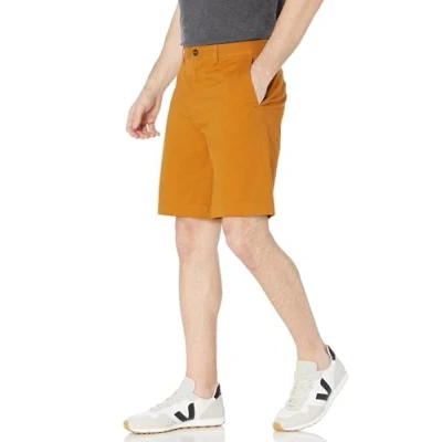 Abbildung von Amazon Essentials Herren Klassisch Geschnittene Chinoshorts, 23 cm, Muskat, 29W