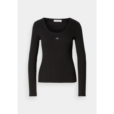 Abbildung von Calvin Klein Jeans Langarmshirt »LS WOVEN LABEL 2X2 RIB SCOOP NEC«, Mit Rundhalsausschnitt, regular fit