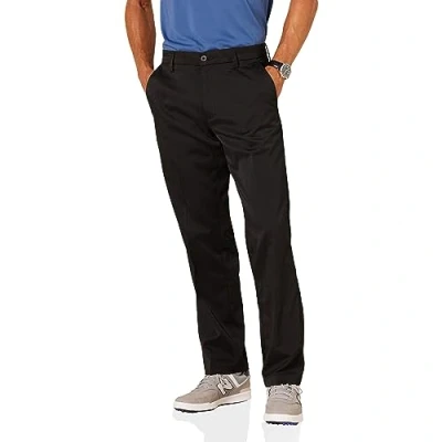 Abbildung von Amazon Essentials Herren Golf Stretchhose, Klassischer Schnitt (erhältlich in Big &amp; Tall), Schwarz, 34W / 31L