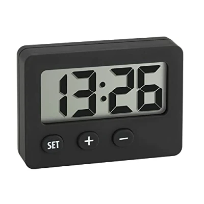 Abbildung von TFA Dostmann Mini Digitaluhr, 60.2013.01, Tischuhr, Quarzuhr, perfekt für KFZ (Wohnmobil oder Auto), Klausuren/Abschlussprüfungen, handlich, mit Magnet, selbstklebender Halter, Ständer, schwarz