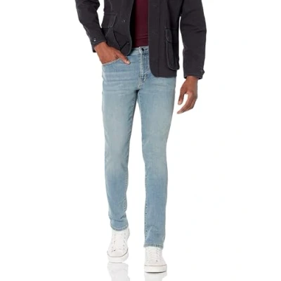 Abbildung von Amazon Essentials Herren Stretchjeans, Skinny Passform, Hellblau Vintage, 36W / 34L