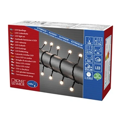 Abbildung von Konstsmide 3695 107 LED Globelichterkette mit kleinen runden Dioden / für Außen (IP44) VDE geprüft 24V Außentrafo 160 warm weiße schwarzes Kabel, Warmweiß