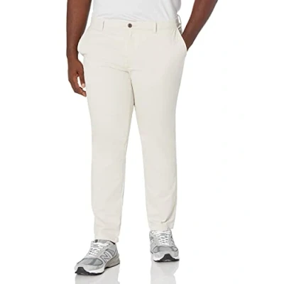 Abbildung von Amazon Essentials Herren Legere Stretch Chinohose mit Enger Passform, Stone, 33W / 28L