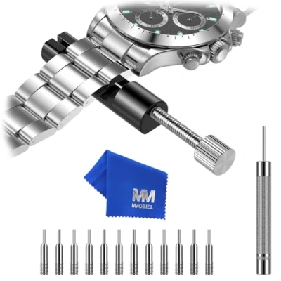 Abbildung von MMOBIEL Uhrenarmband Verbindungsstift Entferner, Reparatur Werkzeug Set für Uhrmacher mit Stiften, Federschieber, Stahlstanzer, Schwarz Größe s, zzzz Kompakt