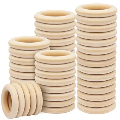 Abbildung von Kurtzy 50x Holzringe zum basteln Ø 55mm Außen Holzring Set aus Naturholz Unbehandelt Bastelring für DIY Deko Mobile Schmuck 50 Stück Gardinenringe Vorhangringe Holz